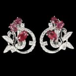 A pair of 925 silver earrings set with rubies and white stones, L. 1.8cm.