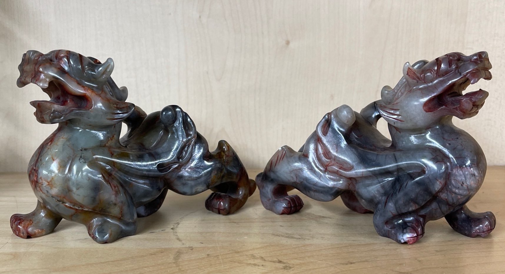 A pair of Chinese carved soapstone dragon figures, H. 10cm. L. 15cm. - Image 2 of 3