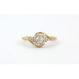 A 9ct yellow gold diamond set cluster ring, (P).