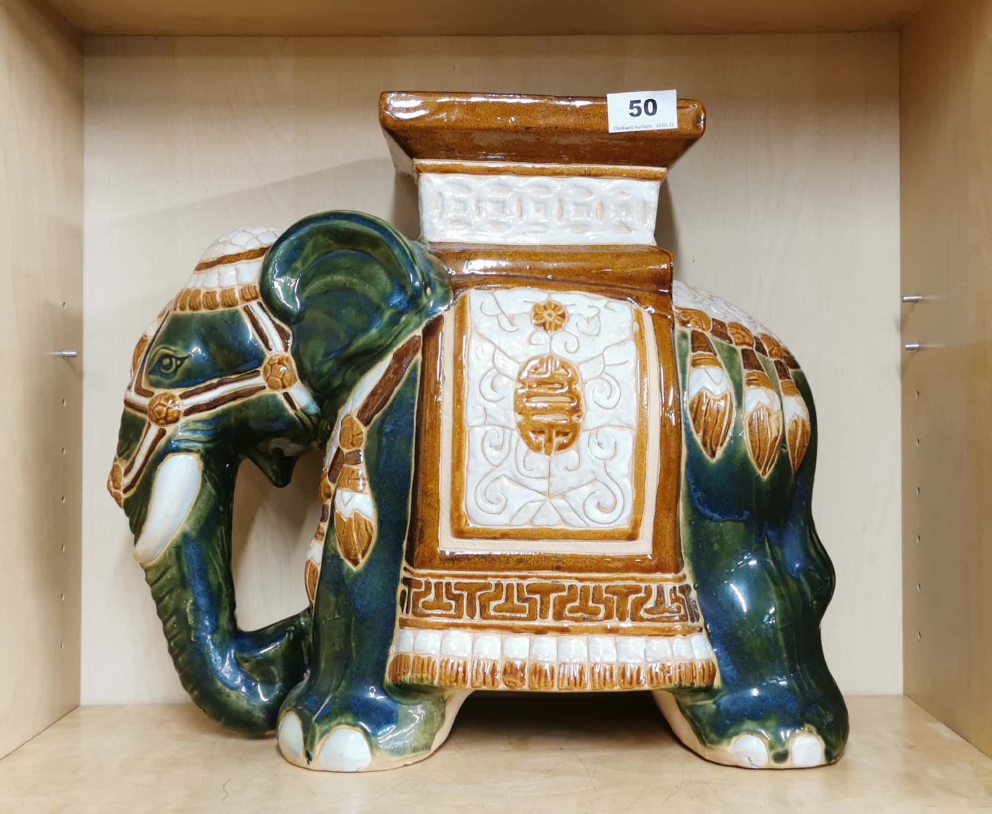 An oriental hand painted ceramic elephant garden stool, H. 38cm.