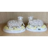 A pair of Staffordshire figures of sheep, W. 13cm. H. 9cm.