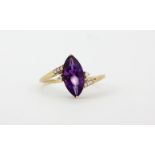 A 9ct yellow gold ring set with a marquise cut amethyst and diamonds, (S).