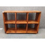 A contemporary sheesham wood cabinet/bookcase, 79.5 x 119 x 36cm.