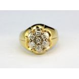 A 14ct yellow gold (stamped 14k) diamond set cluster ring, (P).