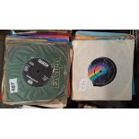 A collection of mixed 45 RPM records.
