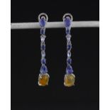 A pair of 925 silver drop earrings set with tanzanite, sapphire and cabochon cut fire opals, L.