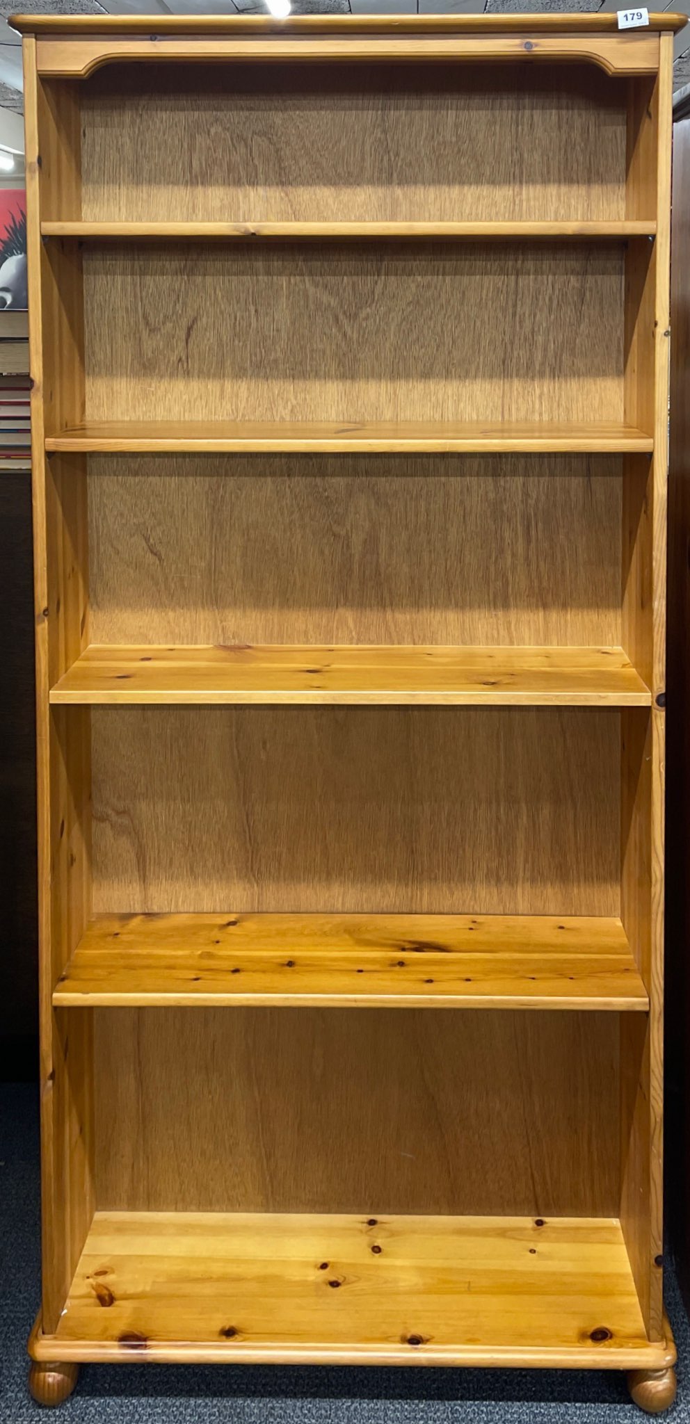 A single pine bookcase, W. 89cm. H. 180cm.