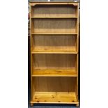A single pine bookcase, W. 89cm. H. 180cm.