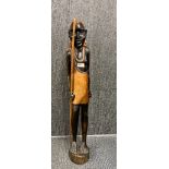 A large carved wooden African tribal figure, H. 91cm.