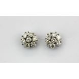 A pair of 18ct white gold (Stamped 750) diamond set cluster earrings, approx. 1ct overall, Dia. 0.