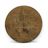 A First World War bronze memorial medal for Edwin Walton.