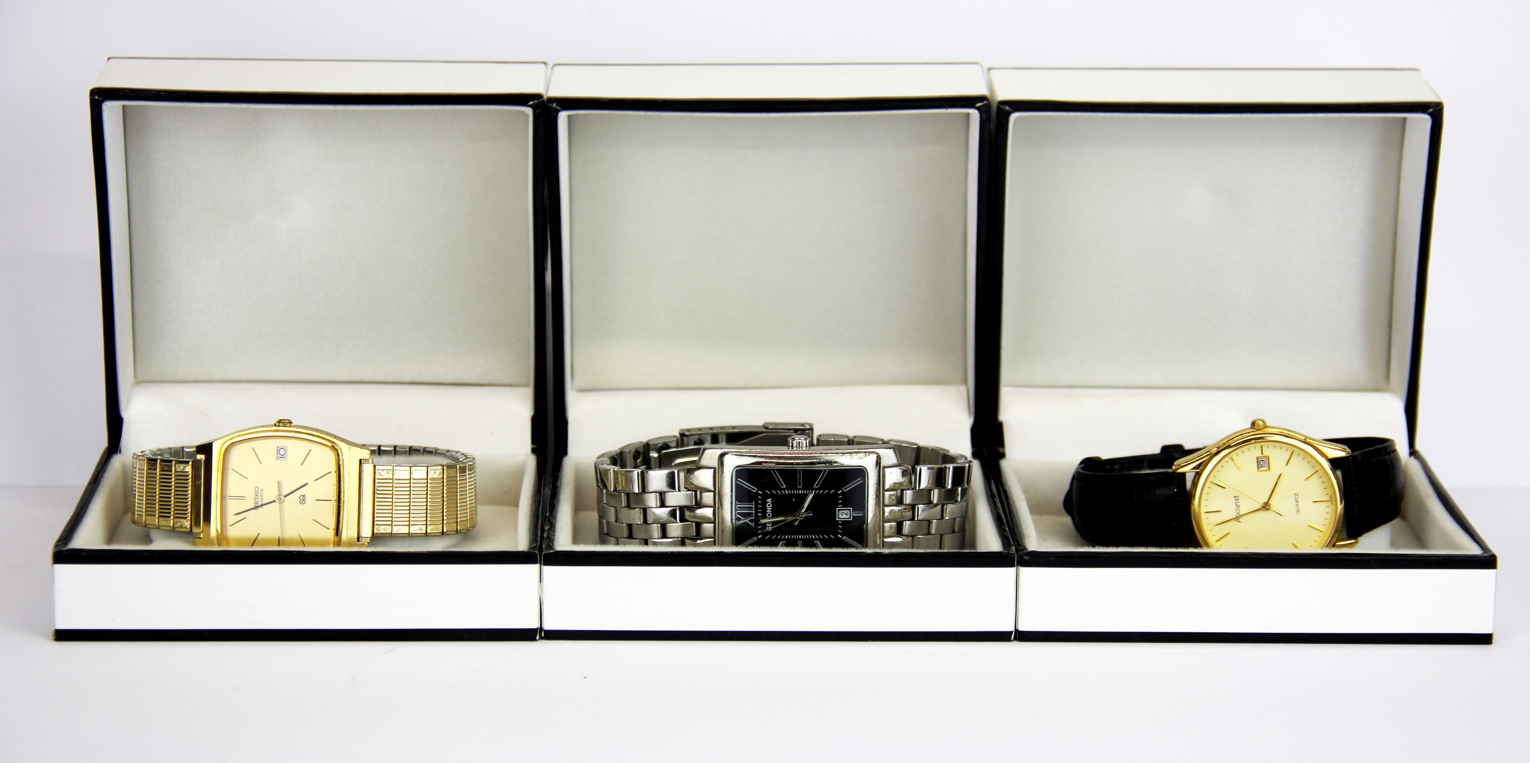 Three boxed gent's watches: Accurist, Seiko and Sekonda.