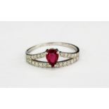 A 18ct white gold ring set with a pear cut unheated ruby and diamond set shoulders, approx. 0.45ct