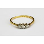 An 18ct yellow gold diamond set trilogy ring, (R).