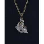 A 9ct yellow gold diamond set pendant and chain, approx. 8.8gr.