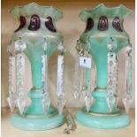 A pair of early 19th Century painted and gilt green glass decorated Bohemian lustres, H. 26.