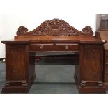An impressive mid-19th Century mahogany and mahogany veneered buffet sideboard with two drawers
