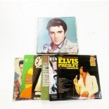 A collection of Elvis Presley records.