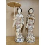 A pair of Japanese carved bone figures of Geisha, H. 32cm.