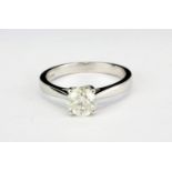 An 18ct white gold solitaire ring set with an approx. 1ct brilliant cut diamond, (M.5).