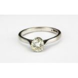 An 18ct white gold (stamped 18ct) brilliant cut solitaire ring, approx. 0.65ct, (N.5).