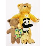 A large English articulated teddy bear, H. 65cm, together with four further toys.