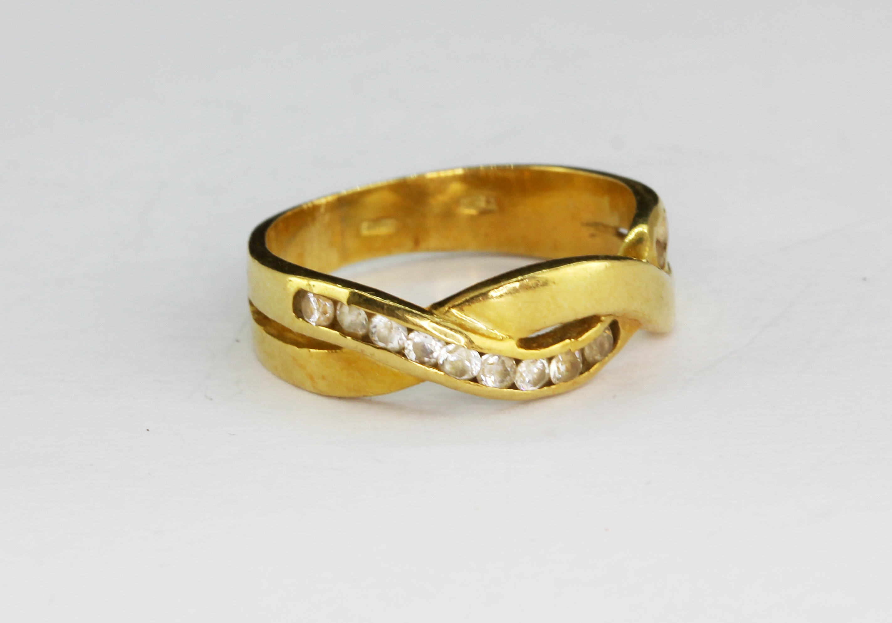 A yellow metal (tested minim 9ct gold) stone set ring, approx. 3.9gr, (K).