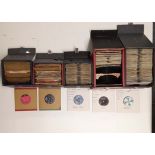 A collection of cased mixed 45 RPM records.