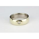 A 9ct white gold diamond set wedding band, (N).