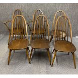 A set of six Ercol dining chairs.