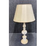 A turned white marble table lamp and shade, H. 95cm.