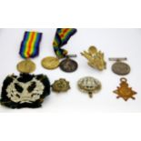 A 1914 Christmas tin together with a group of medals and cap badges, medals for 10209 PT.E.A.Walton,