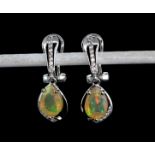 A pair of 925 silver drop earrings set with pear cut opals and white stones, L. 2.6cm.