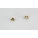 A pair of 18ct yellow gold diamond set stud earrings, approx. 0.20ct.