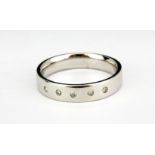 A 9ct white gold diamond set ring, (P.5).