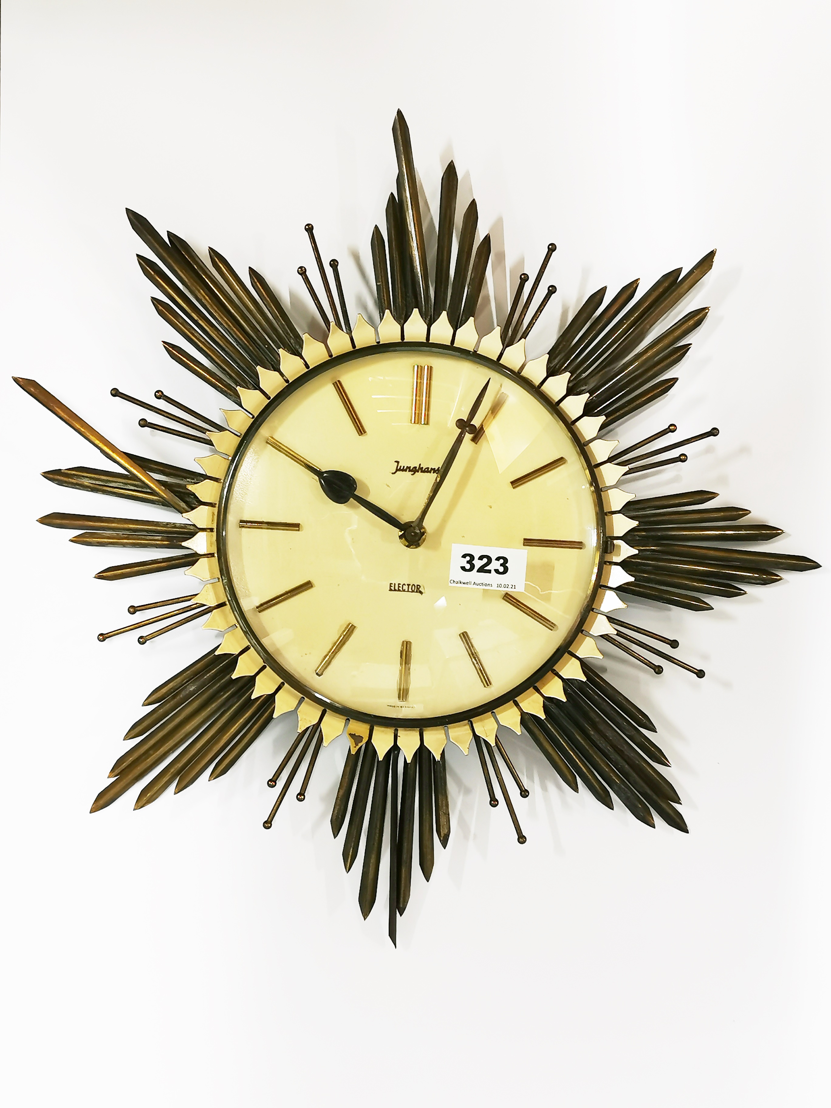 A vintage Junghans Electora battery sunburst clock, dia. 45cm.