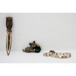 A stamped 925 silver bookmark together with a 925 silver bracelet and a 925 silver and marcasite cat