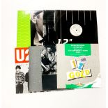 A collection of 12" maxi singles including U2 , Phil Collins and others.