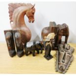 A pair of carved wooden elephant book ends and other carved wooden items, tallest. 41cm.