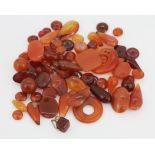 A quantity of unmounted mixed cornelian beads, approx. 305ct.
