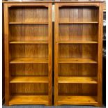 A pair of attractive pine bookcases, 87 x 178cm.
