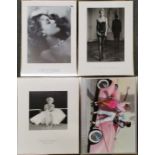 A group of four framed fashion prints / photographs, 45cm x 60cm.