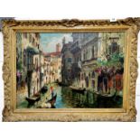 A gilt framed oil on canvas of Venice with indistinct signature, frame size 84cm x 64cm.