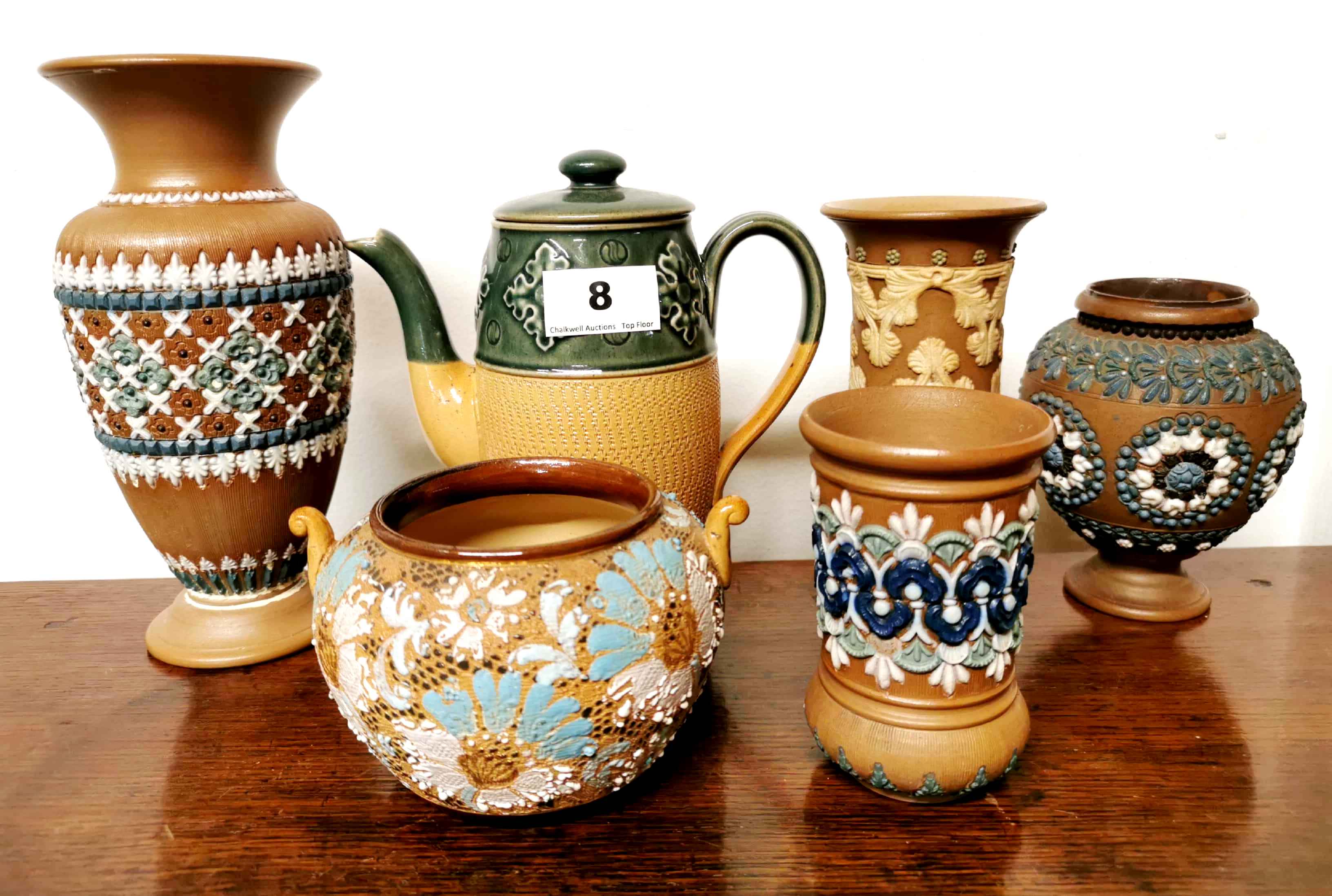 A collection of six Doulton Lambeth stoneware items, tallest 20cm.