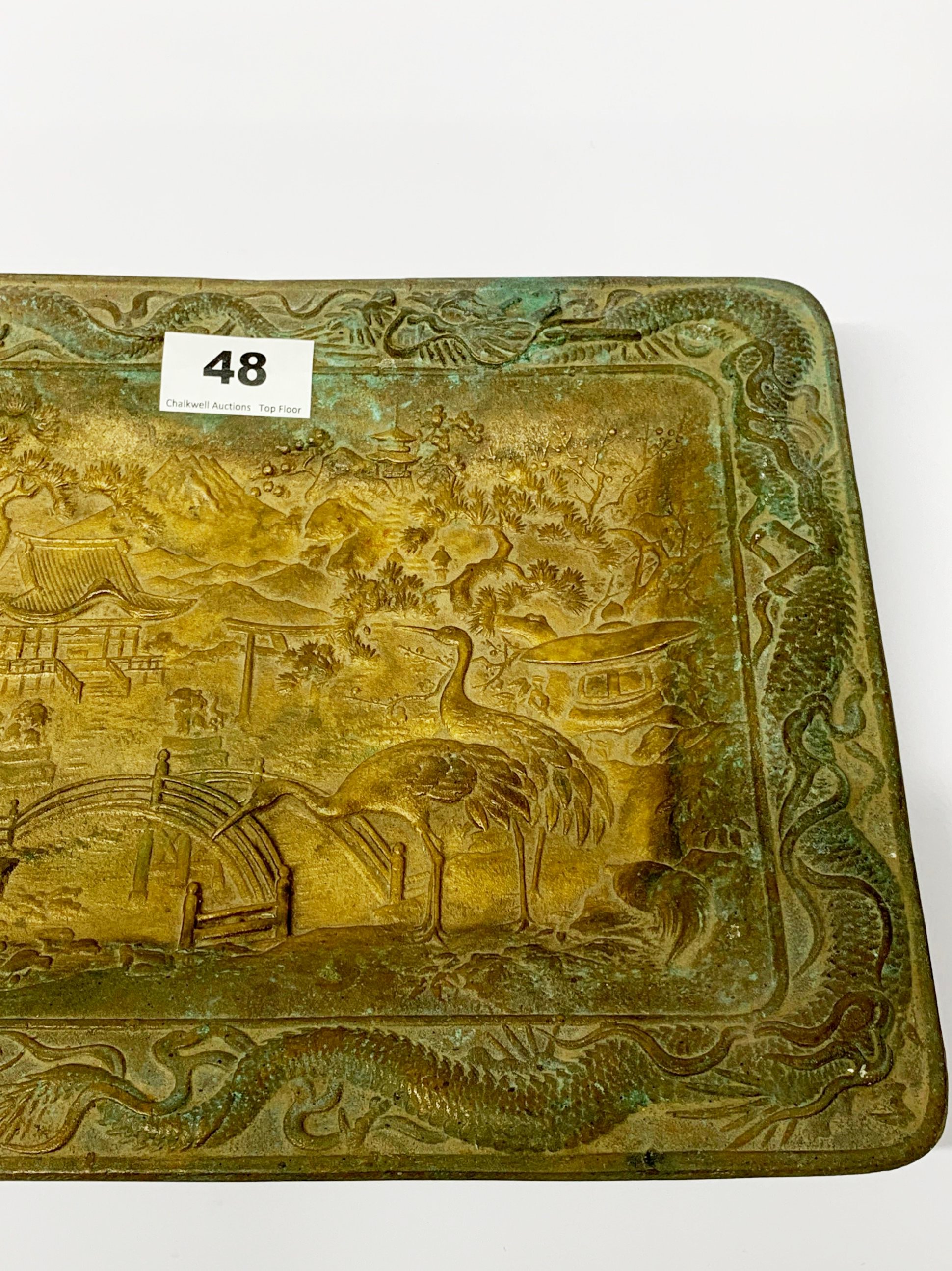 An early 20th Century Chinese gilt bronze bowl standing on four raised feet depicting cranes in a - Image 3 of 4