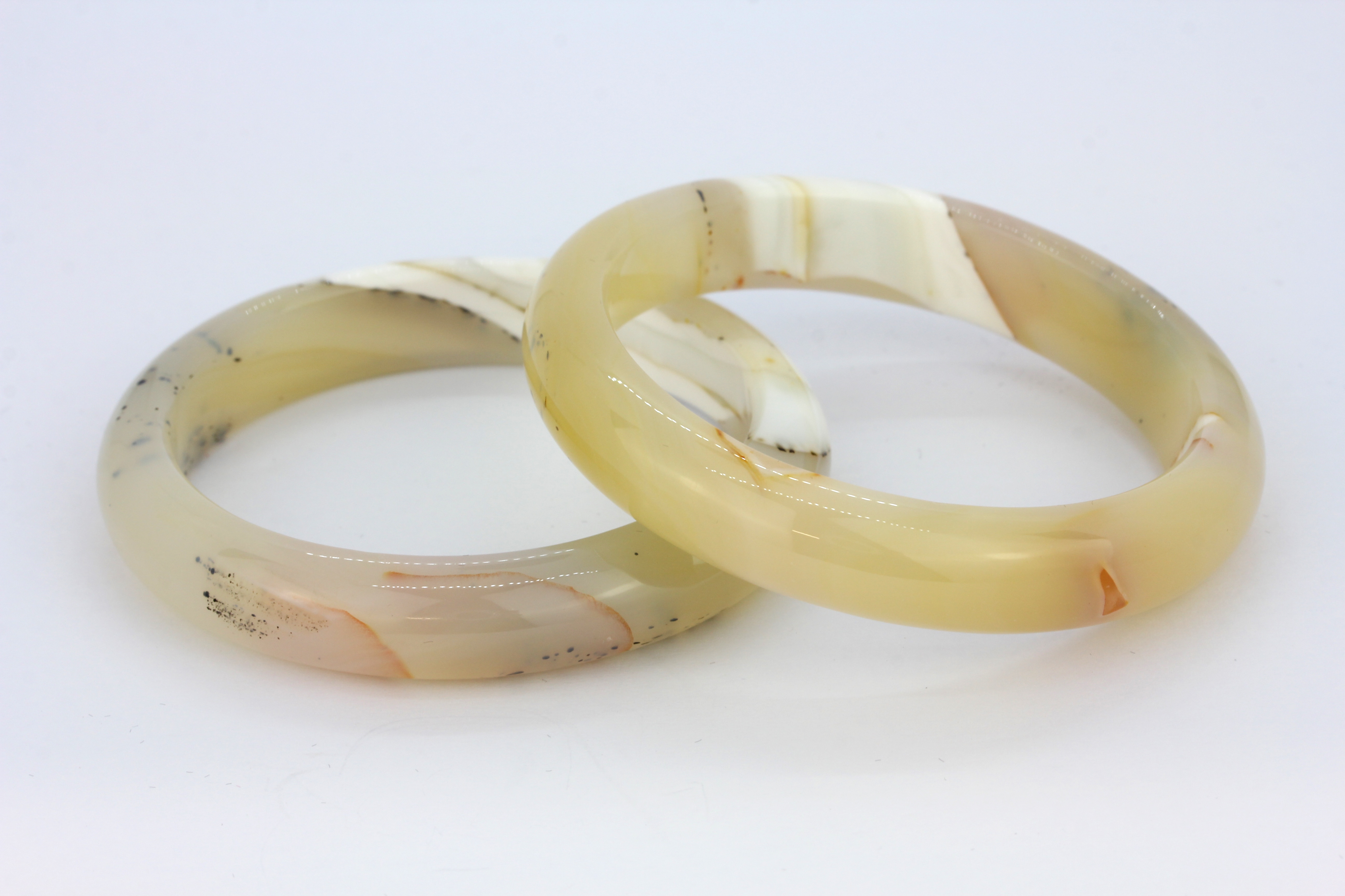 A stunning pair of polished banded and moss agate bangles, W. 12.5mm internal Dia. 6cm. - Image 2 of 3