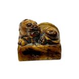 A mid 20th Century Chinese carved soapstone scholar's seal, 5.2 x 3.5 x 5cm.