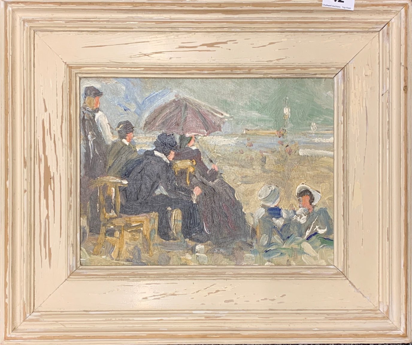 An early 20th Century Impressionist style oil on panel of a beach scene, frame size 50 x 42cm.