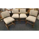 A set of four upholstered beechwood dining/hall chairs.