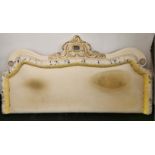 A large super king size carved and gilt wood upholstered bed head, W. 210cm x H. 113cm.